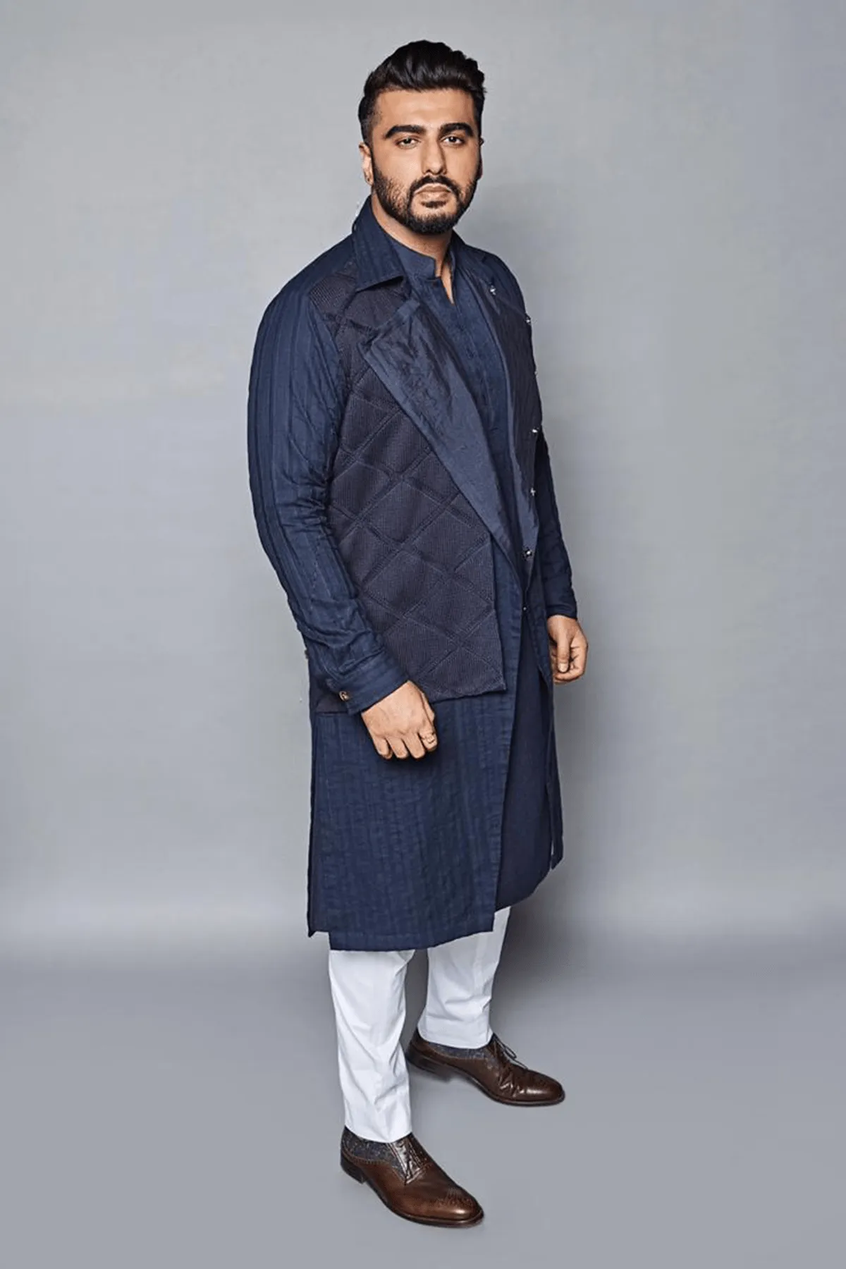 Arjun Kapoor In Dark blue trench style shirt jacket with knit flap