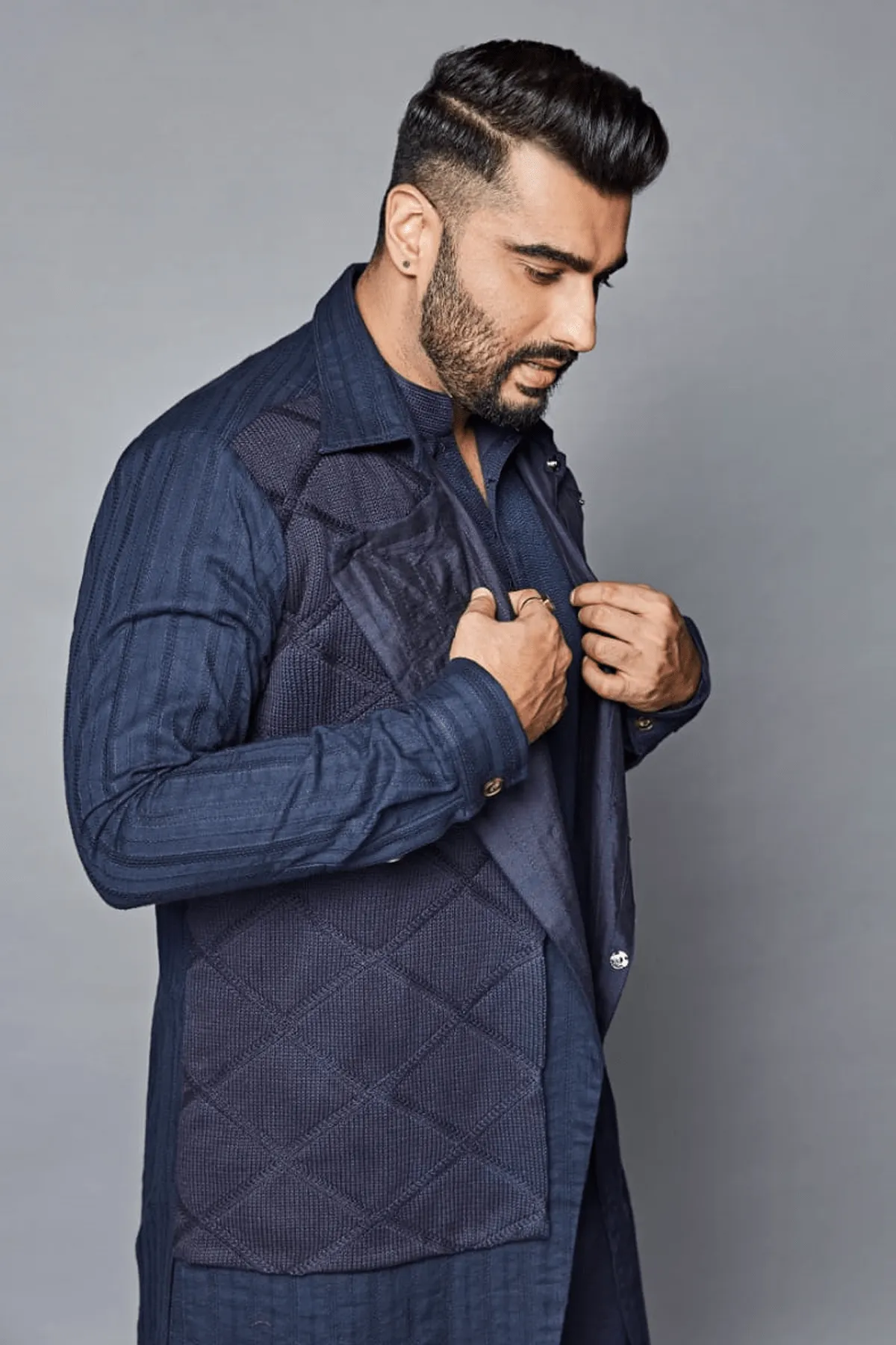 Arjun Kapoor In Dark blue trench style shirt jacket with knit flap