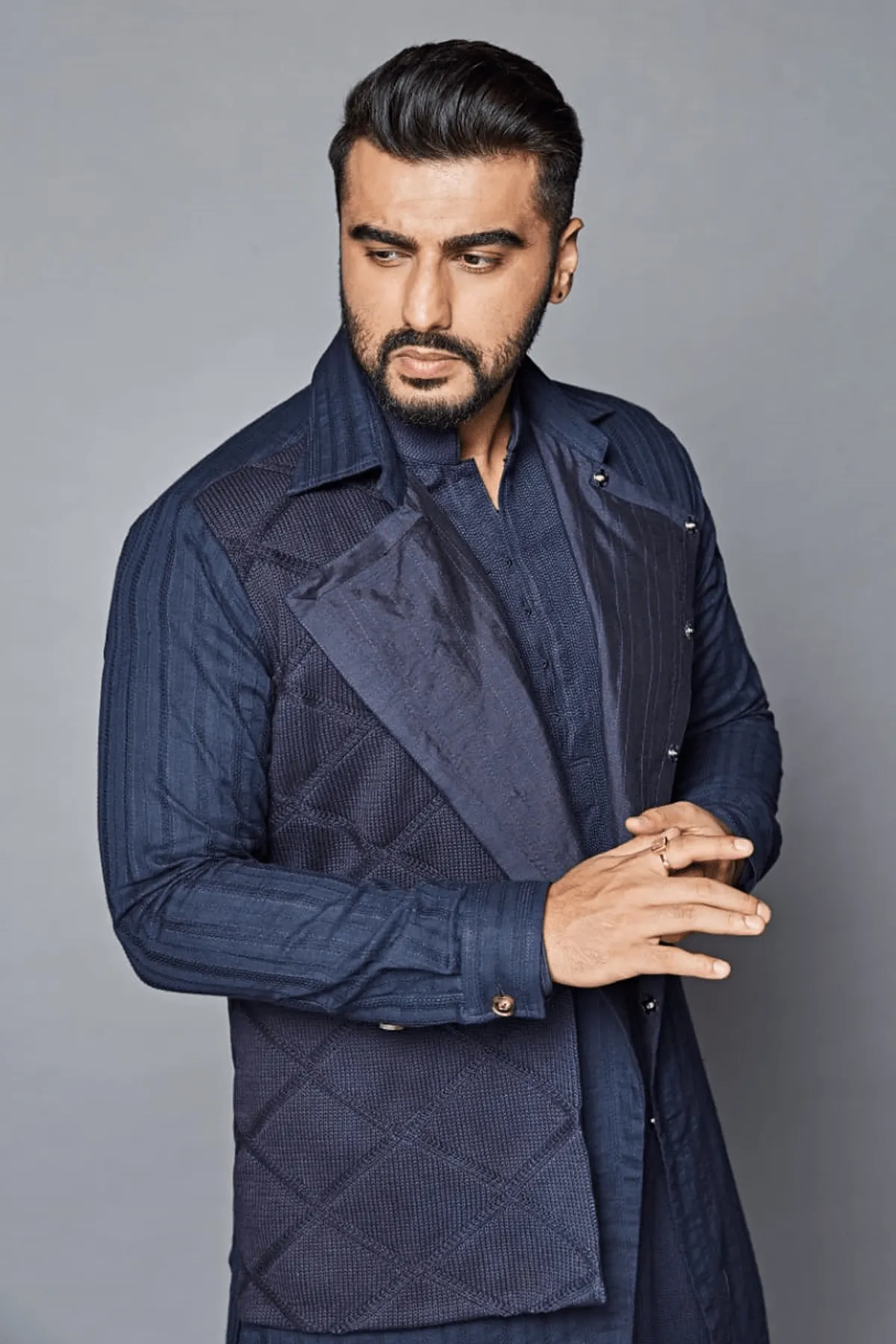 Arjun Kapoor In Dark blue trench style shirt jacket with knit flap